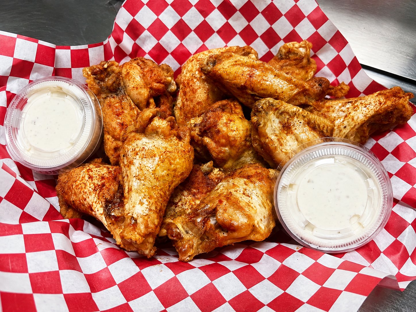 A dozen seasoned wings with ranch